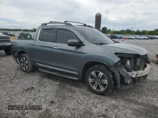 2017 Honda Ridgeline RTL-E with VIN 5FPYK3F77HB009995, listed as a Copart auction lot 59954705 with 119,381 mi miles and Salvage title. Bid and sale history available at DreamBid. Image 4.