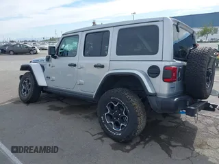 2023 Jeep Wrangler Rubicon with VIN 1C4JJXR69PW581474, listed as a IAAI auction lot 41697016 with 25,775 mi miles and . Bid and sale history available at DreamBid. Image 3.