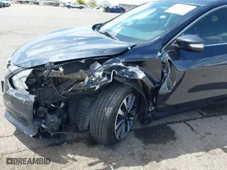 2016 Nissan Altima 2.5 S with VIN 1N4AL3AP8GC133418, listed as a IAAI auction lot 41932707 with 104,830 mi miles. Bid and sale history available at carsss.com. Image 6.
