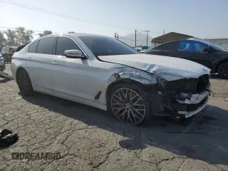 2020 BMW 5 Series 540i z VIN WBAJS1C01LCD37859, wystawiony jako Copart lot #61483155 z przebiegiem 49 087 mil mil oraz Szkoda całkowita • Salvage title. Historia ofert i sprzedaży dostępna na DreamBid. Obrazek 4.