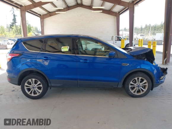 2017 Ford Escape SE with VIN 1FMCU0G9XHUC81634, listed as a IAAI auction lot 42180555 with 193,274 mi miles and . Bid and sale history available at DreamBid. Image 14.