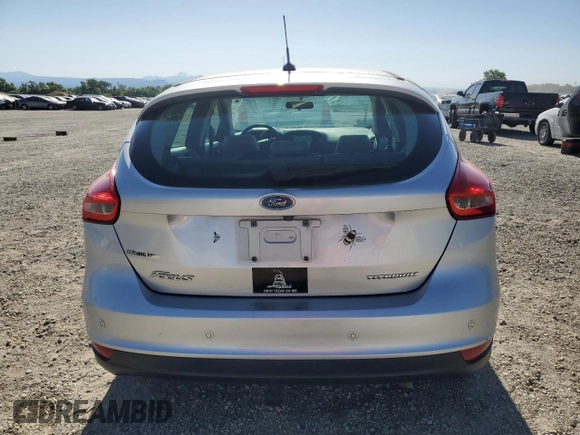 2017 Ford Focus Titanium with VIN 1FADP3N21HL279810, listed as a Copart auction lot 57950195 with 121,139 mi miles and Salvage title. Bid and sale history available at DreamBid. Image 6.