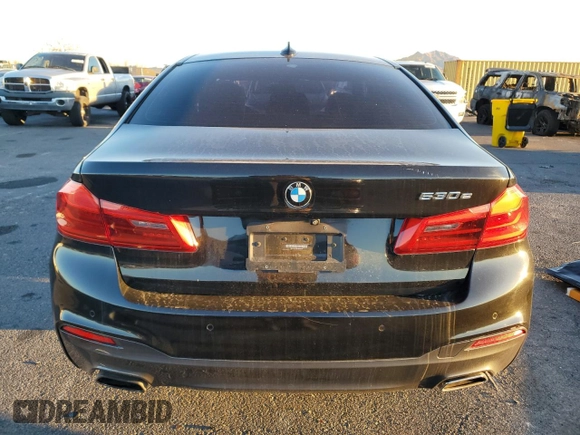 2018 BMW 5 Series 530e z VIN WBAJA9C58JB249470, wystawiony jako Copart lot #46319335 z przebiegiem 28 000 mil mil oraz Szkoda całkowita • Salvage title. Historia ofert i sprzedaży dostępna na DreamBid. Obrazek 6.