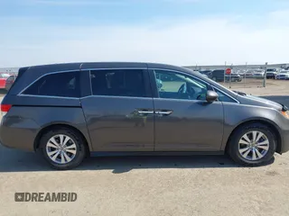 2014 Honda Odyssey EX-L z VIN 5FNRL5H64EB031426, wystawiony jako IAAI lot #41777542 z przebiegiem 162 426 mil mil oraz . Historia ofert i sprzedaży dostępna na DreamBid. Obrazek 13.