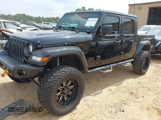 2021 Jeep Gladiator Willys with VIN 1C6HJTAG7ML514114, listed as a IAAI auction lot 42399793 with 78,829 mi miles and . Bid and sale history available at DreamBid. Image 2.