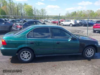 2000 Honda Civic LX with VIN 1HGEJ6672YL022393, listed as a IAAI auction lot 41968262 with 231,261 mi miles. Bid and sale history available at carsss.com. Image 13.