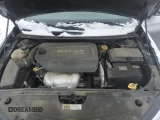 2015 Chrysler 200 Limited z VIN 1C3CCCAB2FN527267, wystawiony jako Copart lot #58697625 z przebiegiem 142 170 mil mil oraz Szkoda całkowita • Salvage title. Historia ofert i sprzedaży dostępna na DreamBid. Obrazek 13.