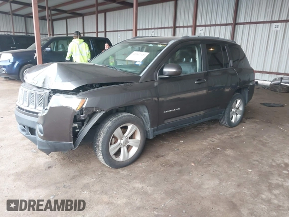 2016 Jeep Compass Latitude with VIN 1C4NJCEA2GD599833, listed as a IAAI auction lot 41507729 with 107,187 mi miles. Bid and sale history available at carsss.com. Image 2.