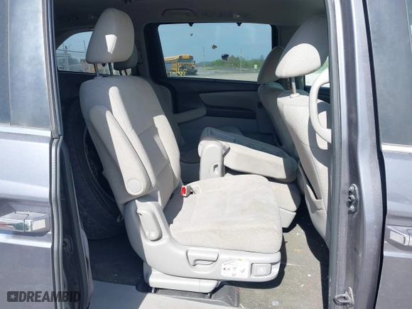 2016 Honda Odyssey SE with VIN 5FNRL5H3XGB043251, listed as a IAAI auction lot 42050805 with 156,537 mi miles. Bid and sale history available at carsss.com. Image 8.