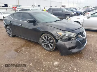 2016 Nissan Maxima Platinum z VIN 1N4AA6AP8GC390831, wystawiony jako IAAI lot #42092863 z przebiegiem 160 882 mil mil oraz . Historia ofert i sprzedaży dostępna na DreamBid. Obrazek 1.