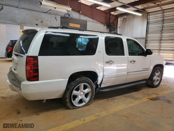 2014 Chevrolet Suburban LTZ with VIN 1GNSCKE0XER127997, listed as a Copart auction lot 42411525 with 228,690 mi miles and Salvage Title. Bid and sale history available at carsss.com. Image 3.