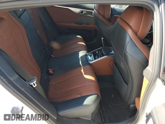 2023 BMW 8 Series M850i with VIN WBAGV8C01PCM79724, listed as a Copart auction lot 69486194 with 14,285 mi miles and Salvage title. Bid and sale history available at DreamBid. Image 10.