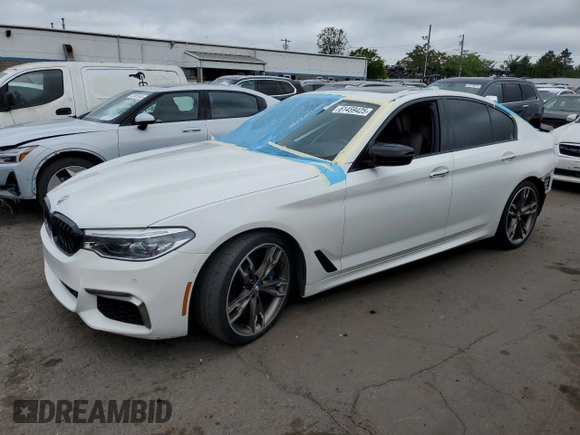 2018 BMW 5 Series M550i xDrive with VIN WBAJB9C5XJB035996, listed as a Copart auction lot 61459425 with Not provided miles and Salvage title. Bid and sale history available at DreamBid. Image 1.