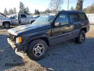 1998 Jeep Grand Cherokee Laredo with VIN 1J4GZ58S0WC106148, listed as a Copart auction lot 42855105 with 263,785 mi miles and Salvage Title. Bid and sale history available at carsss.com. Image 1.