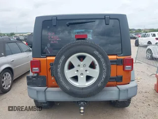 2011 Jeep Wrangler Sport with VIN 1J4AA2D1XBL579882, listed as a IAAI auction lot 42122353 with 153,885 mi miles and . Bid and sale history available at carsss.com. Image 16.