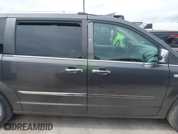 2014 Chrysler Town & Country Touring L with VIN 2C4RC1CG7ER300693, listed as a IAAI auction lot 41849463 with 174,203 mi miles and . Bid and sale history available at carsss.com. Image 13.