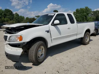 2000 Ford F-150 XL z VIN 1FTRX18L0YNA65615, wystawiony jako Copart lot #58508375 z przebiegiem Nie podano mil oraz Szkoda całkowita • Salvage title. Historia ofert i sprzedaży dostępna na DreamBid. Obrazek 1.