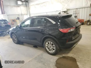 2021 Ford Escape SE with VIN 1FMCU9G69MUB23483, listed as a Copart auction lot 61095385 with 54,562 mi miles and Salvage title. Bid and sale history available at DreamBid. Image 2.