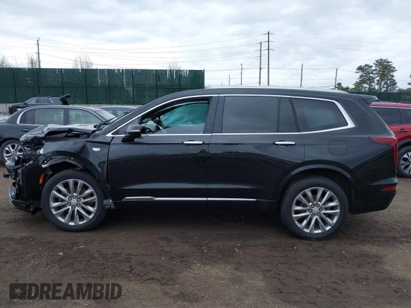 2021 Cadillac XT6 Premium Luxury with VIN 1GYKPCRSXMZ222454, listed as a IAAI auction lot 41648439 with 113,547 mi miles and . Bid and sale history available at carsss.com. Image 14.