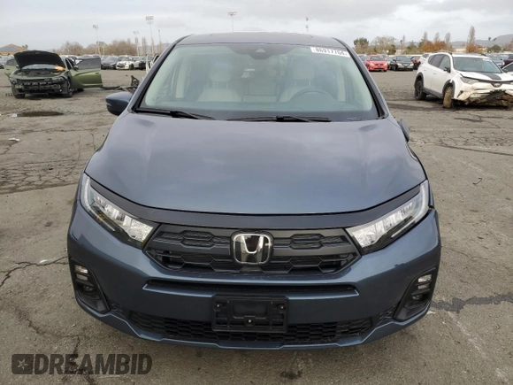 2025 Honda Odyssey EX-L with VIN 5FNRL6H69SB005860, listed as a Copart auction lot 86917704 with 4,582 mi miles and Salvage Title. Bid and sale history available at carsss.com. Image 5.