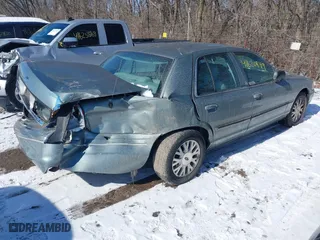 2005 Ford Crown Victoria LX with VIN 2FAFP74W85X131494, listed as a IAAI auction lot 41620849 with 127,245 mi miles. Bid and sale history available at carsss.com. Image 4.