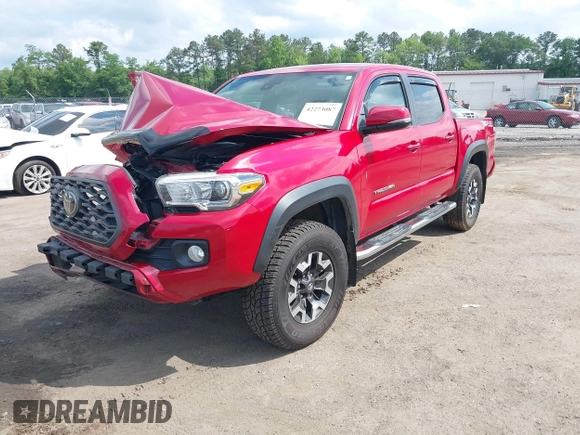 2021 Toyota Tacoma SR z VIN 5TFCZ5AN2MX263159, wystawiony jako IAAI lot #42273087 z przebiegiem 69 220 mil mil oraz . Historia ofert i sprzedaży dostępna na DreamBid. Obrazek 16.