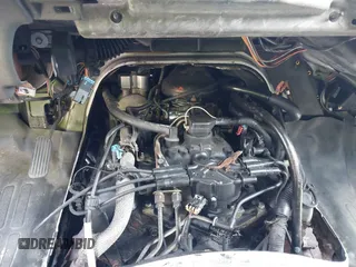 2002 GMC Savana z VIN 1GTFG15W821171973, wystawiony jako IAAI lot #41784349 z przebiegiem 167 236 mil mil oraz . Historia ofert i sprzedaży dostępna na DreamBid. Obrazek 14.