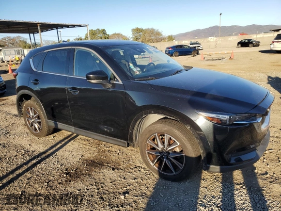 2018 Mazda CX-5 Grand Touring with VIN JM3KFBDMXJ0318474, listed as a Copart auction lot 46438545 with 58,702 mi miles and Salvage Title. Bid and sale history available at DreamBid. Image 4.