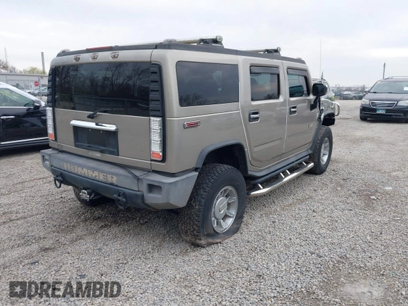 2004 Hummer H2 z VIN 5GRGN23U94H100078, wystawiony jako IAAI lot #42028741 z przebiegiem 106 795 mil mil oraz . Historia ofert i sprzedaży dostępna na DreamBid. Obrazek 4.