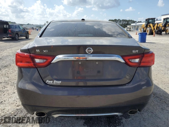 2016 Nissan Maxima SR z VIN 1N4AA6APXGC439401, wystawiony jako Copart lot #52011535 z przebiegiem 132 267 mil mil oraz Szkoda całkowita • Salvage title. Historia ofert i sprzedaży dostępna na DreamBid. Obrazek 6.