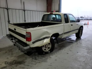 1997 Toyota T100 SR5 with VIN JT4UN24D9V0048079, listed as a Copart auction lot 87042344 with 303,785 mi miles and Salvage Title. Bid and sale history available at DreamBid. Image 3.