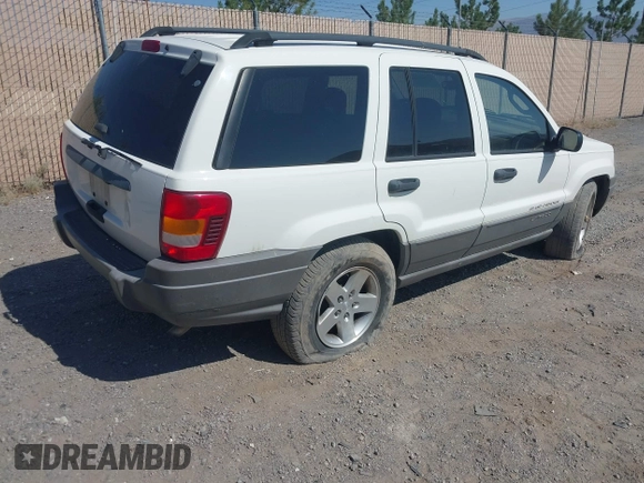 2004 Jeep Grand Cherokee Laredo with VIN 1J4GX48SX4C151160, listed as a IAAI auction lot 42765441 with 176,179 mi miles and . Bid and sale history available at DreamBid. Image 4.
