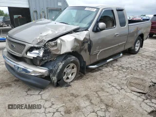 2003 Ford F-150 XL with VIN 2FTRX17W13CA05482, listed as a Copart auction lot 61053015 with 142,041 mi miles and Salvage title. Bid and sale history available at DreamBid. Image 1.
