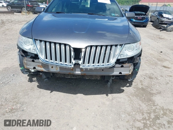 2011 Lincoln MKS EcoBoost with VIN 1LNHL9FT3BG610366, listed as a IAAI auction lot 42274043 with 196,811 mi miles and . Bid and sale history available at DreamBid. Image 6.