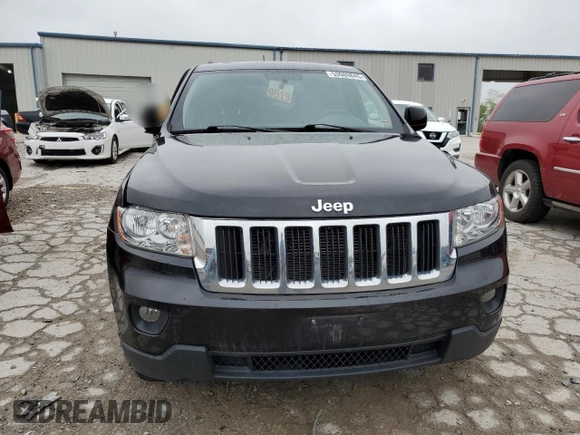 2011 Jeep Grand Cherokee Laredo z VIN 1J4RR4GG2BC662746, wystawiony jako Copart lot #53989845 z przebiegiem 138 402 mil mil oraz Szkoda całkowita • Salvage title. Historia ofert i sprzedaży dostępna na DreamBid. Obrazek 5.