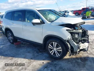 2017 Honda Pilot EX-L z VIN 5FNYF6H61HB074392, wystawiony jako IAAI lot #41323625 z przebiegiem Nie podano mil oraz . Historia ofert i sprzedaży dostępna na DreamBid. Obrazek 1.