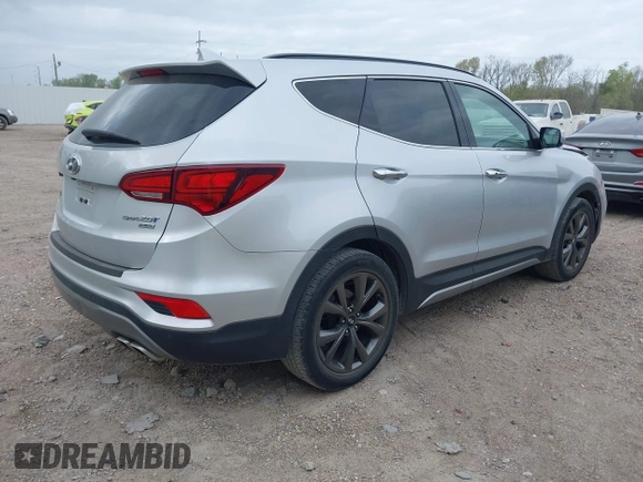 2018 Hyundai Santa Fe Ultimate z VIN 5XYZW4LAXJG536063, wystawiony jako IAAI lot #41795012 z przebiegiem 46 586 mil mil oraz . Historia ofert i sprzedaży dostępna na DreamBid. Obrazek 4.