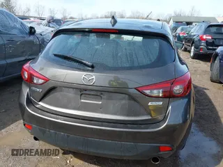 2014 Mazda 3 S Grand Touring with VIN JM1BM1M39E1149581, listed as a IAAI auction lot 41813917 with 143,019 mi miles and . Bid and sale history available at DreamBid. Image 17.