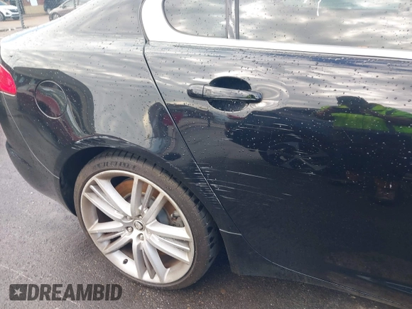 2010 Jaguar XF Supercharged with VIN SAJWA0HE1AMR64142, listed as a IAAI auction lot 42073475 with 119,177 mi miles. Bid and sale history available at carsss.com. Image 6.