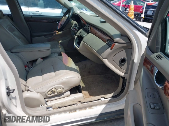 2002 Cadillac DeVille z VIN 1G6KD54Y42U206950, wystawiony jako IAAI lot #42189419 z przebiegiem 98 150 mil mil oraz . Historia ofert i sprzedaży dostępna na DreamBid. Obrazek 5.