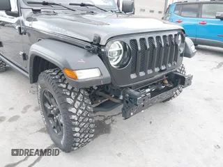 2021 Jeep Wrangler Unlimited Sport S with VIN 1C4HJXDN9MW822281, listed as a IAAI auction lot 41163183 with 23,665 mi miles and . Bid and sale history available at DreamBid. Image 6.