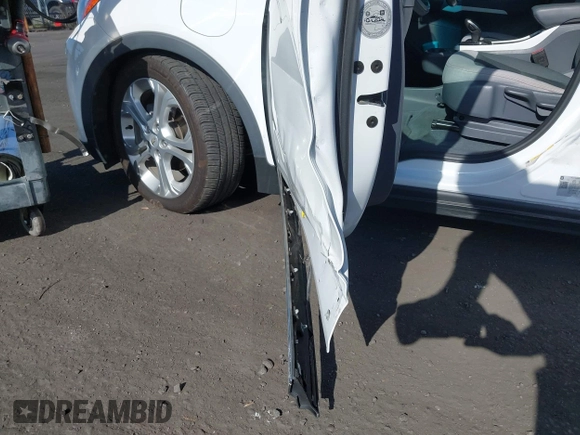 2020 Chevrolet Bolt EV LT with VIN 1G1FY6S03L4132176, listed as a IAAI auction lot 42211304 with 62,063 mi miles and . Bid and sale history available at DreamBid. Image 22.