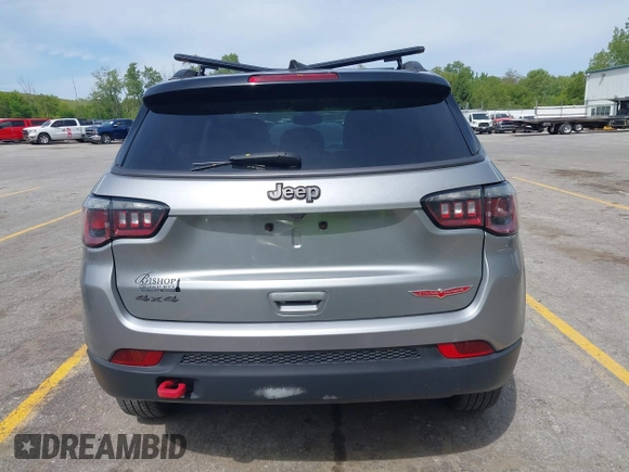 2020 Jeep Compass Trailhawk z VIN 3C4NJDDB0LT221532, wystawiony jako IAAI lot #42310215 z przebiegiem 78 464 mil mil oraz . Historia ofert i sprzedaży dostępna na DreamBid. Obrazek 16.