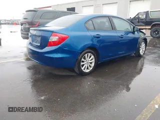 2012 Honda Civic EX with VIN 2HGFB2F89CH537142, listed as a IAAI auction lot 42024927 with 123,063 mi miles and . Bid and sale history available at DreamBid. Image 4.