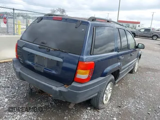 2003 Jeep Grand Cherokee Laredo with VIN 1J4GW48S63C591605, listed as a IAAI auction lot 41973681 with 177,024 mi miles and . Bid and sale history available at DreamBid. Image 4.
