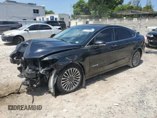 2017 Ford Fusion Hybrid Titanium with VIN 3FA6P0RU4HR388556, listed as a Copart auction lot 57772415 with 47,047 mi miles and Salvage title. Bid and sale history available at DreamBid. Image 1.