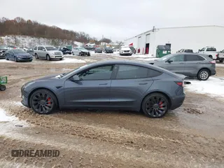2023 Tesla Model 3 Performance with VIN 5YJ3E1EC6PF590739, listed as a IAAI auction lot 40919165 with 20,474 mi miles. Bid and sale history available at carsss.com. Image 15.