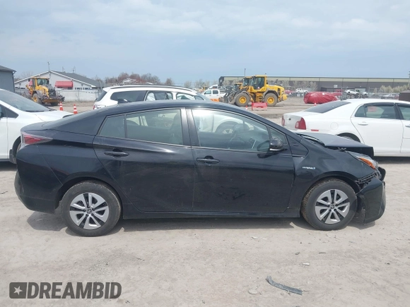 2017 Toyota Prius Two with VIN JTDKARFUXH3041931, listed as a IAAI auction lot 42075004 with 75,768 mi miles and . Bid and sale history available at DreamBid. Image 13.