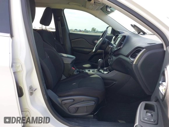 2019 Jeep Cherokee Latitude with VIN 1C4PJMCB5KD212940, listed as a IAAI auction lot 41762856 with 86,777 mi miles. Bid and sale history available at carsss.com. Image 5.