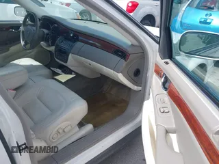 2003 Cadillac DeVille z VIN 1G6KD54Y23U221187, wystawiony jako IAAI lot #42339315 z przebiegiem 82 681 mil mil oraz . Historia ofert i sprzedaży dostępna na DreamBid. Obrazek 5.